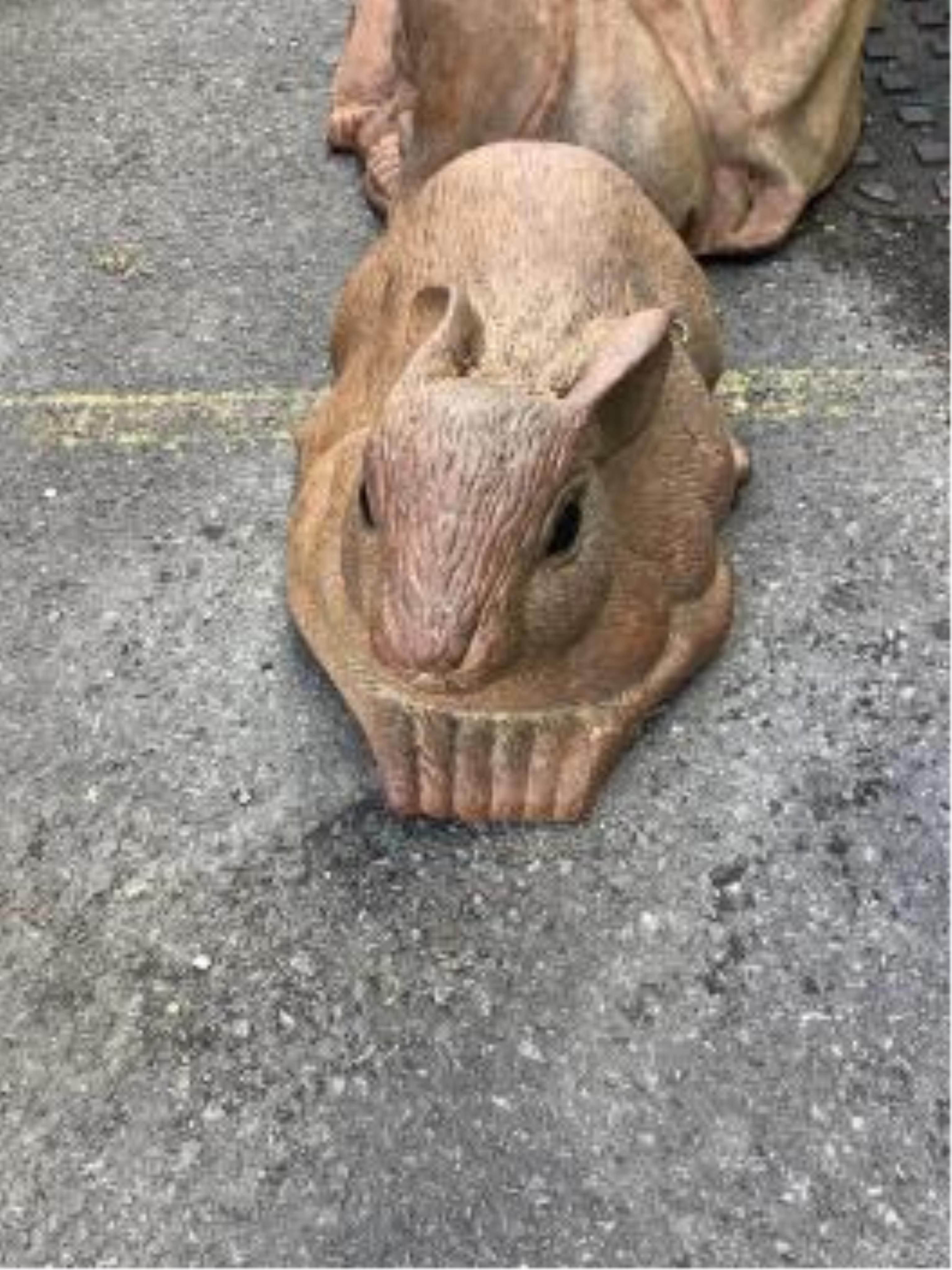 A terracotta seated Buddha garden ornament, height 54cm. Condition - fair